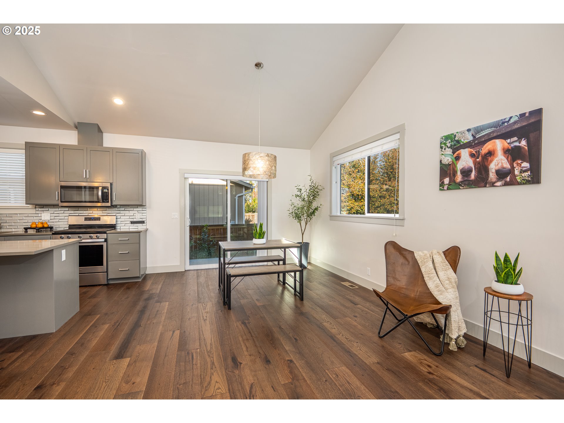 3352 Zane Lane Eugene, OR 97404 - Photo 7 of 42 a open kitchen with cabinets table and chairs