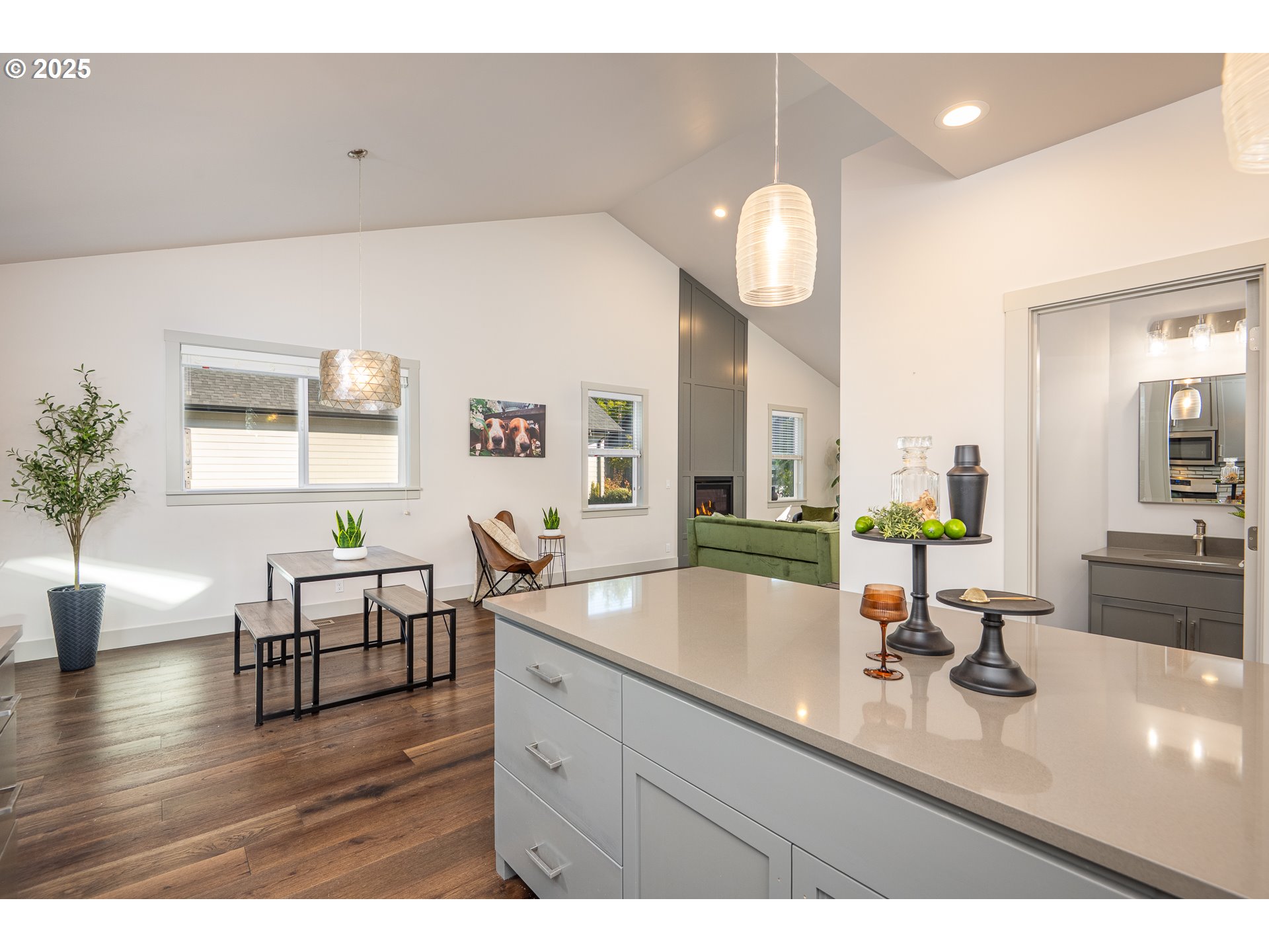3352 Zane Lane Eugene, OR 97404 - Photo 10 of 42 a bathroom with a sink a mirror and a large window