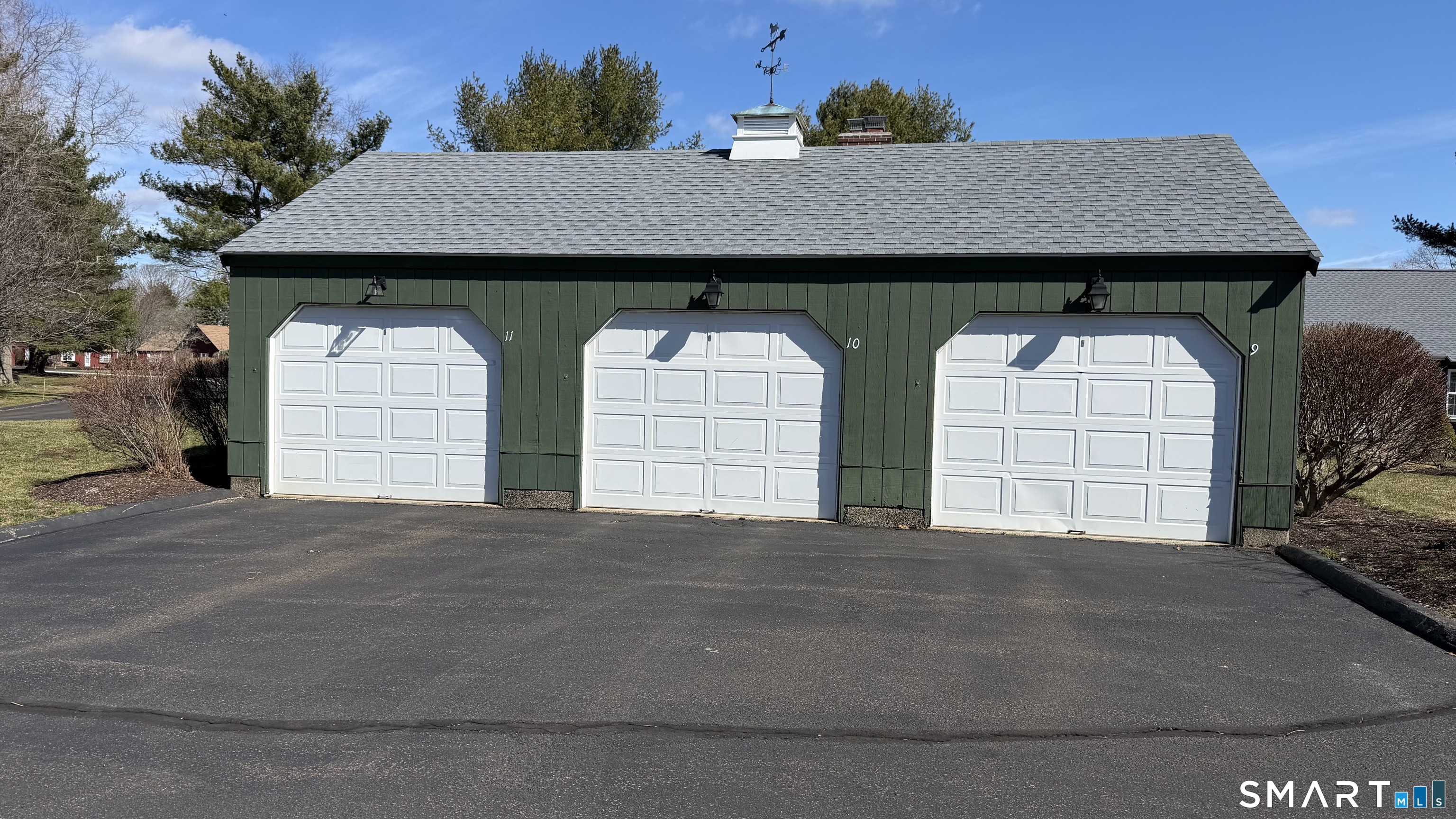 10 Runnymede Lane, Unit 10 Madison, CT 06443 - Photo 25 of 33 Garage #10, center. More storage space as well.