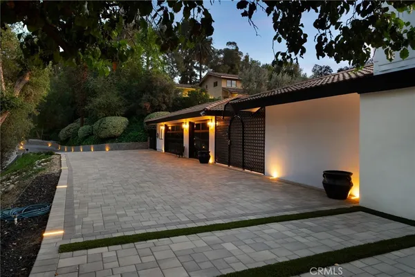 a backyard of a house with lots of green space