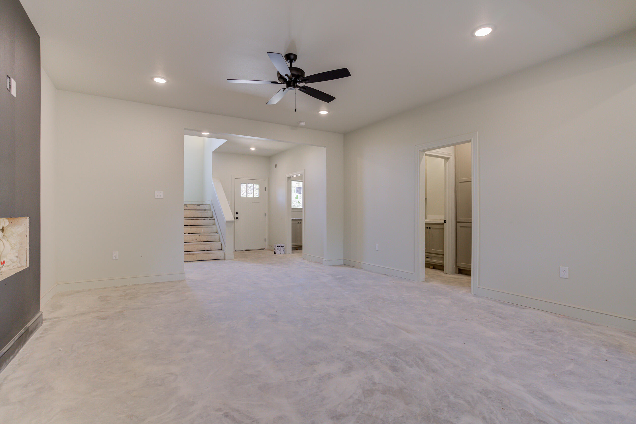 3423 24th Street Lubbock, TX 79410 - Photo 11 of 45 en view interior of a house with a ceiling fan