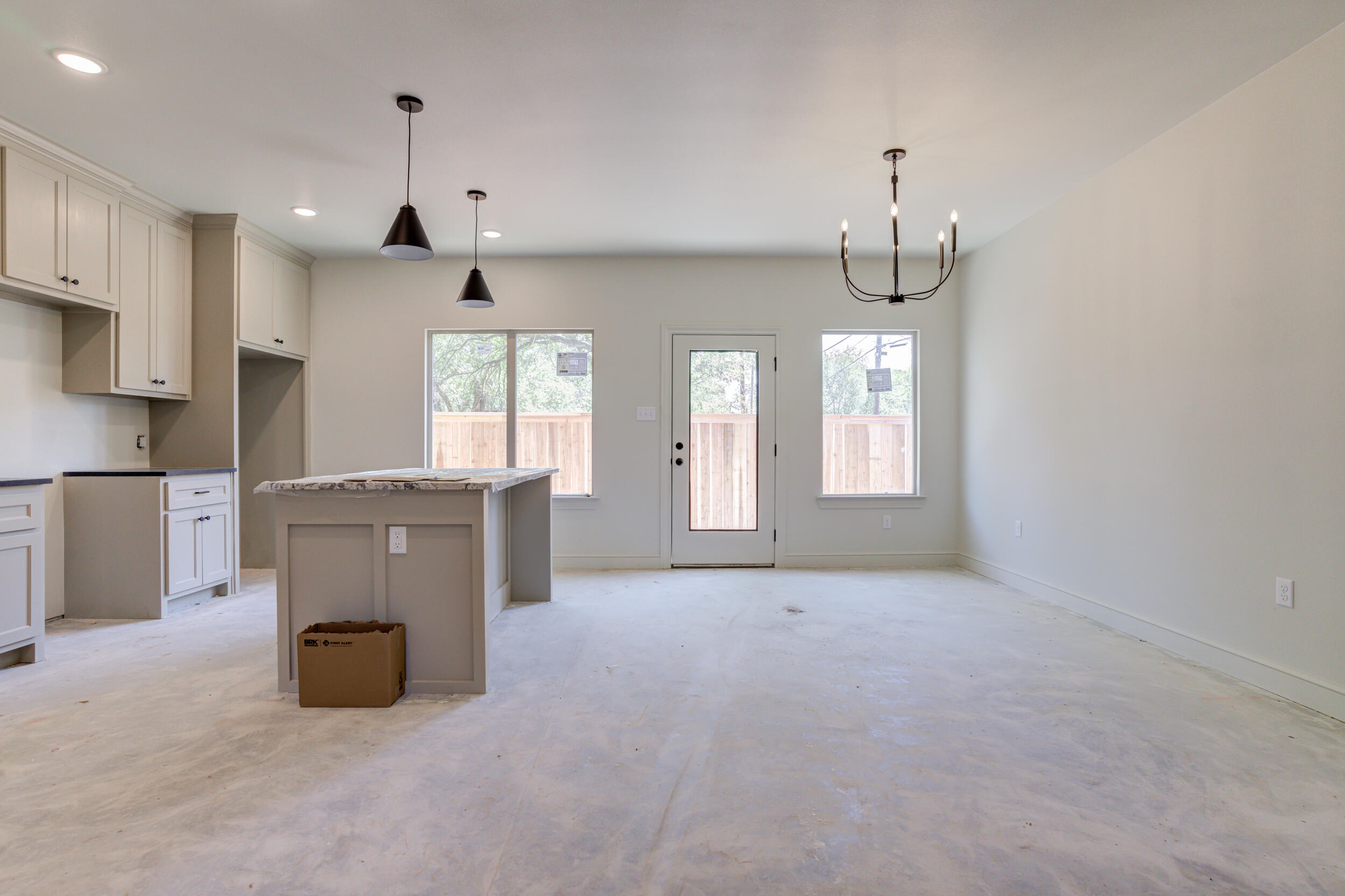 3423 24th Street Lubbock, TX 79410 - Photo 21 of 45 a view of a kitchen with furniture and window
