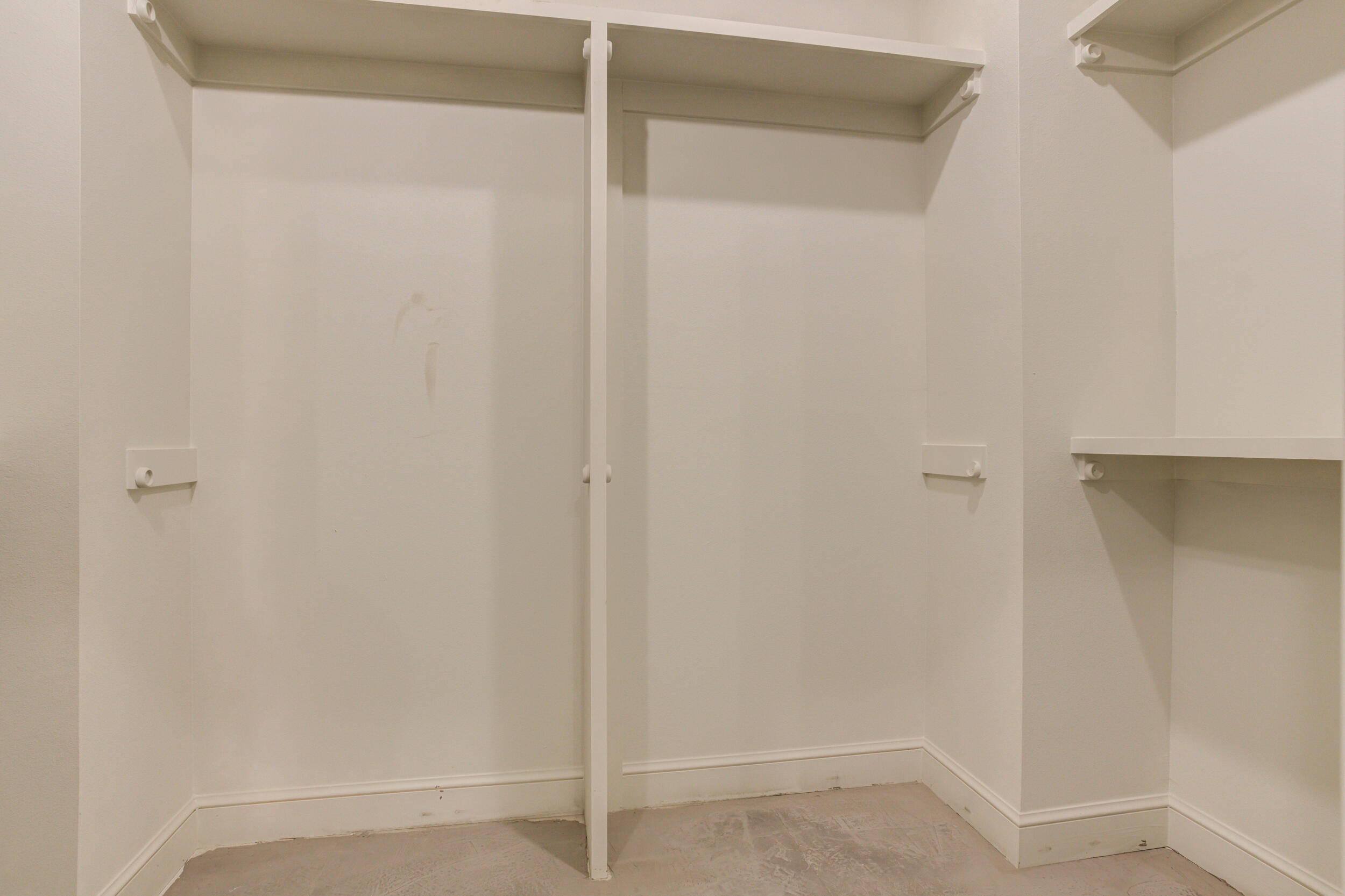 3423 24th Street Lubbock, TX 79410 - Photo 35 of 45 a bathroom with a glass shower door