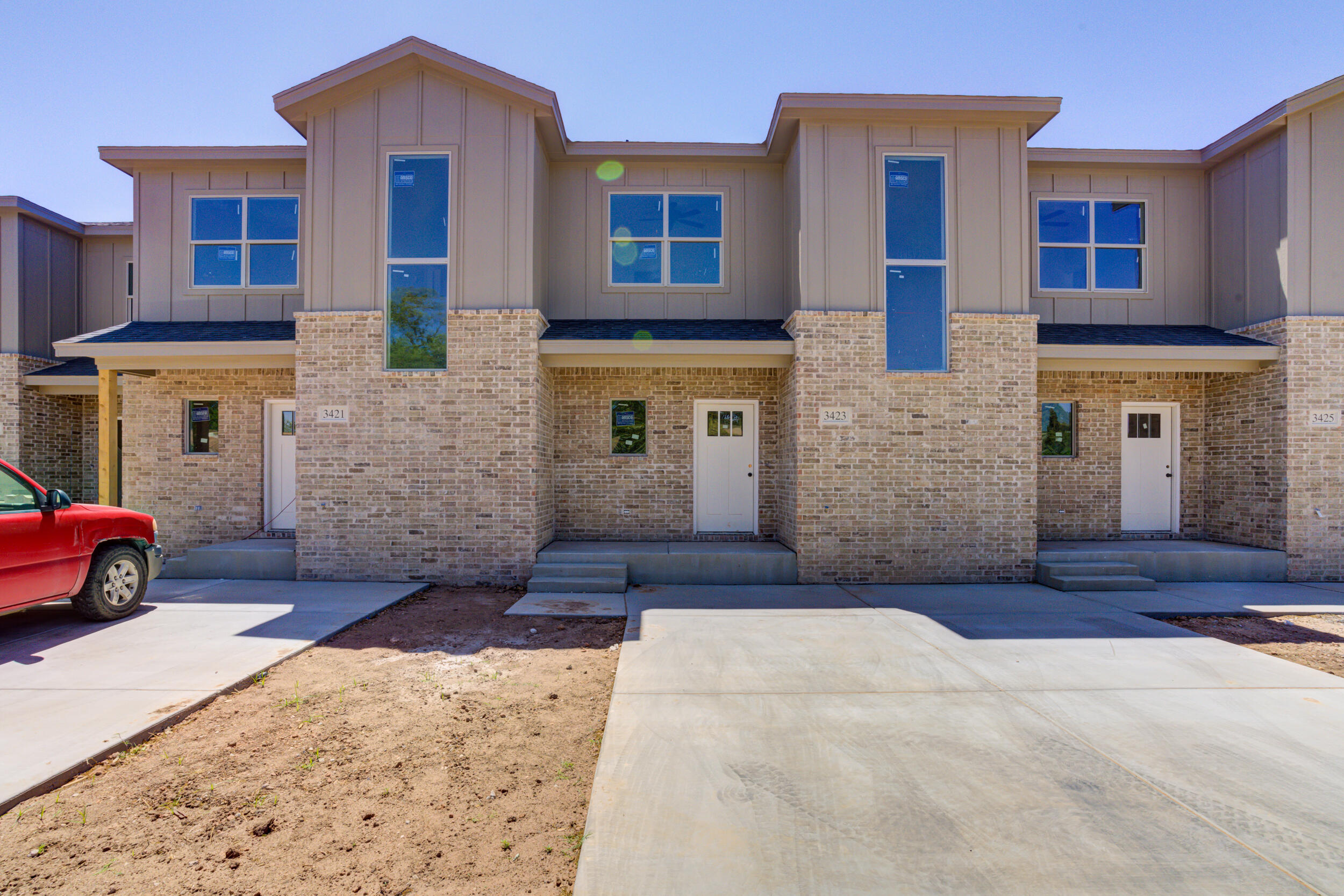 3423 24th Street Lubbock, TX 79410 - Photo 6 of 45 a front view of a house with yard