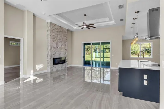 a view of livingroom with furniture and floor to ceiling window