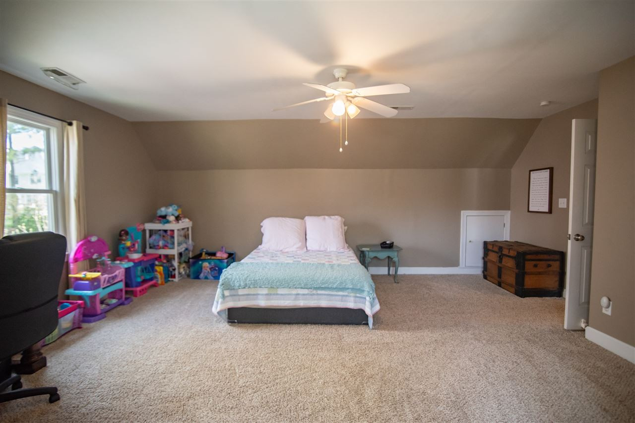 9116 Dawnshire Road Raleigh, NC 27615 - Photo 22 of 30 Bonus Room? Bedroom? Versatility is the name of the game! Bonus Room