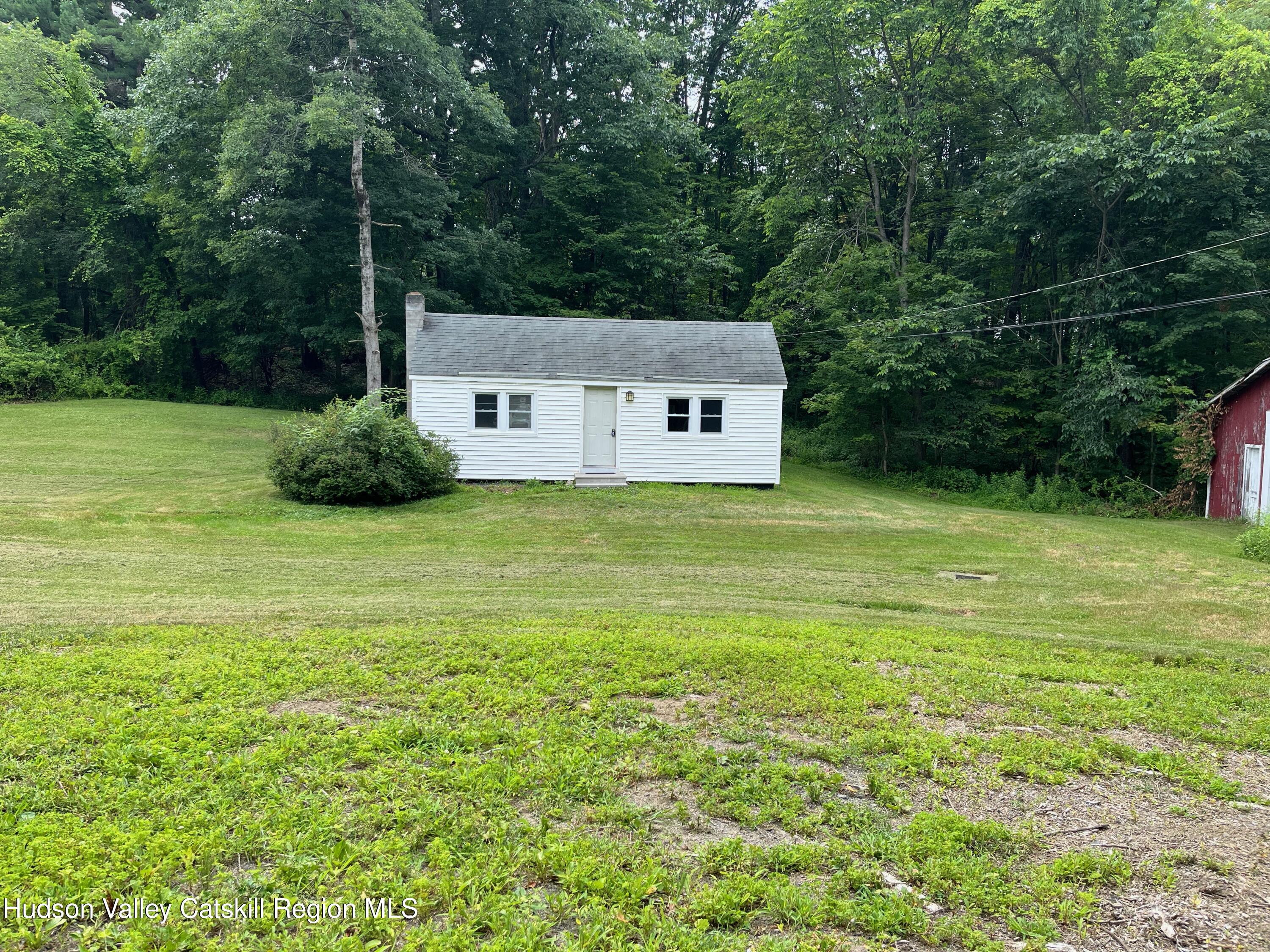 601 Fischer Road Kinderhook, NY 12106 - Photo 11 of 13 a view of a house with a backyard