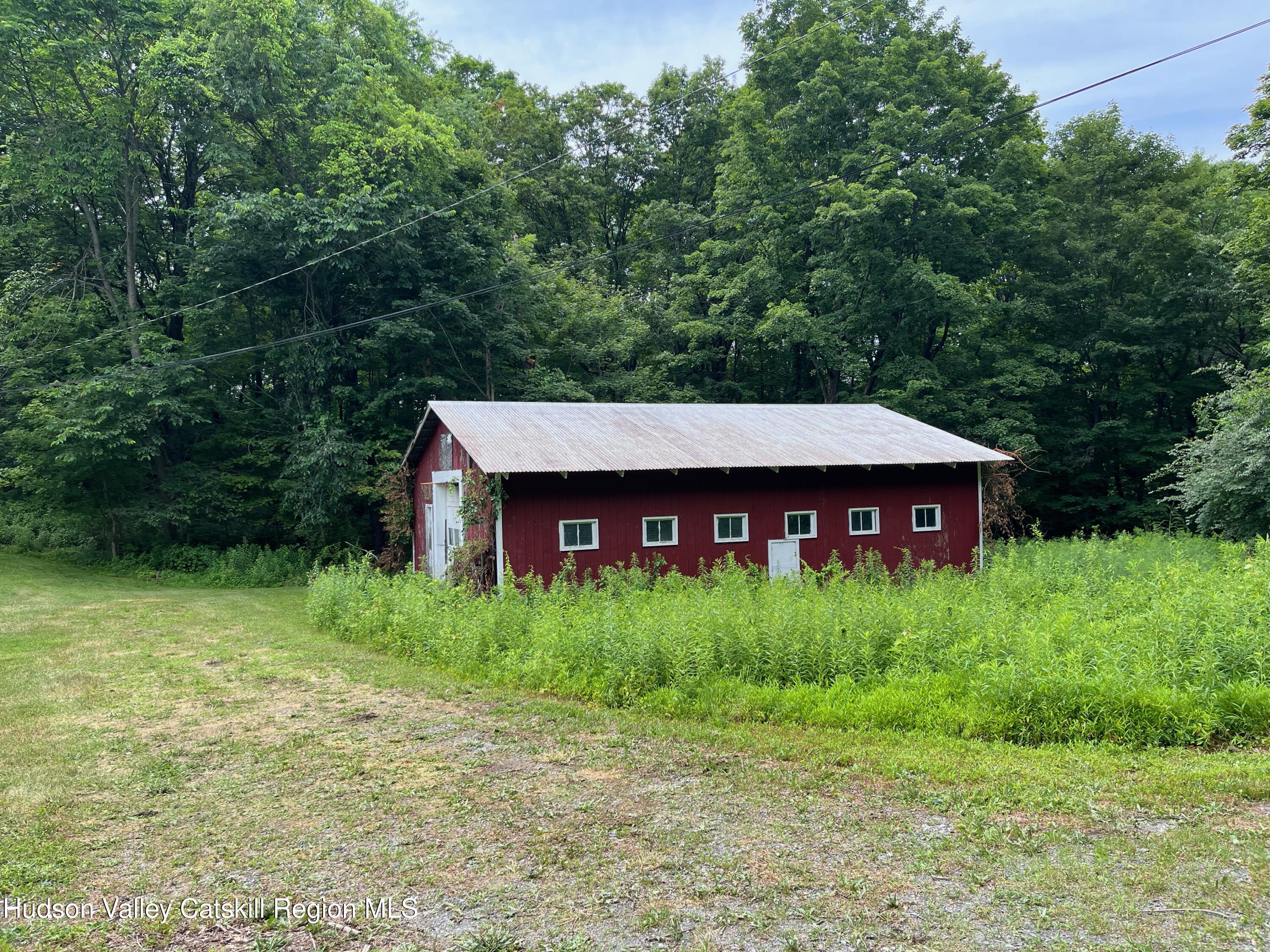 601 Fischer Road Kinderhook, NY 12106 - Photo 12 of 13 a view of a barn house and a yard