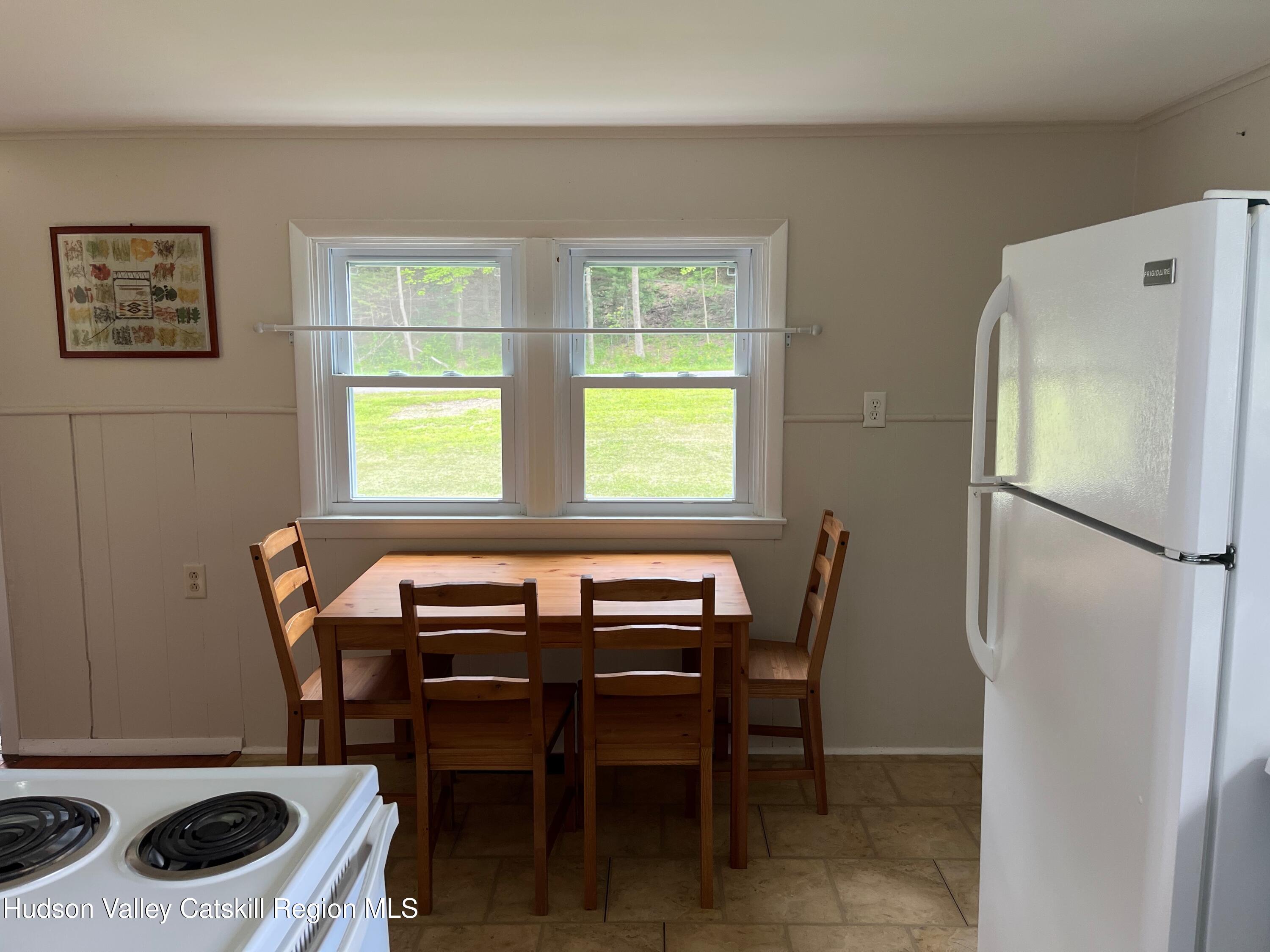 601 Fischer Road Kinderhook, NY 12106 - Photo 4 of 13 a dining room with furniture and window