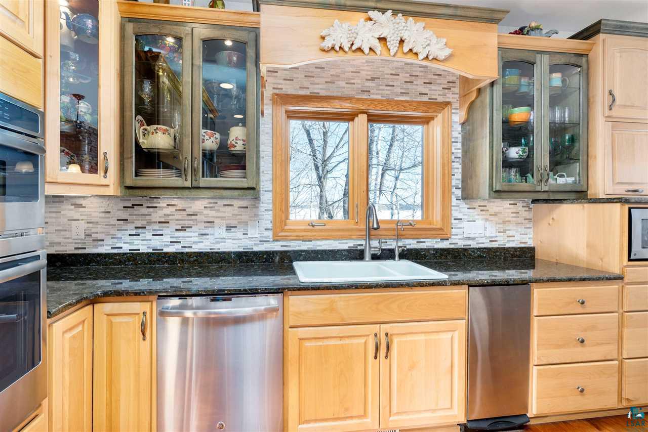 5960 North Pike Lake Road Duluth, MN 55811 - Photo 11 of 49 With Granite Counters and Knot Free Alder Cabinetry from Hermantown Millwork