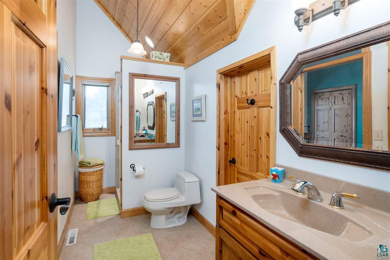 5960 North Pike Lake Road Duluth, MN 55811 - Photo 21 of 49 A 3/4 Bath on the second level is attached to the Suite or Storage!