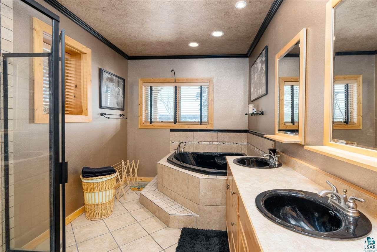 5960 North Pike Lake Road Duluth, MN 55811 - Photo 28 of 49 Tub, Stone , Tile! This sumptuous bath has Lake Views!A Stunning Bath!