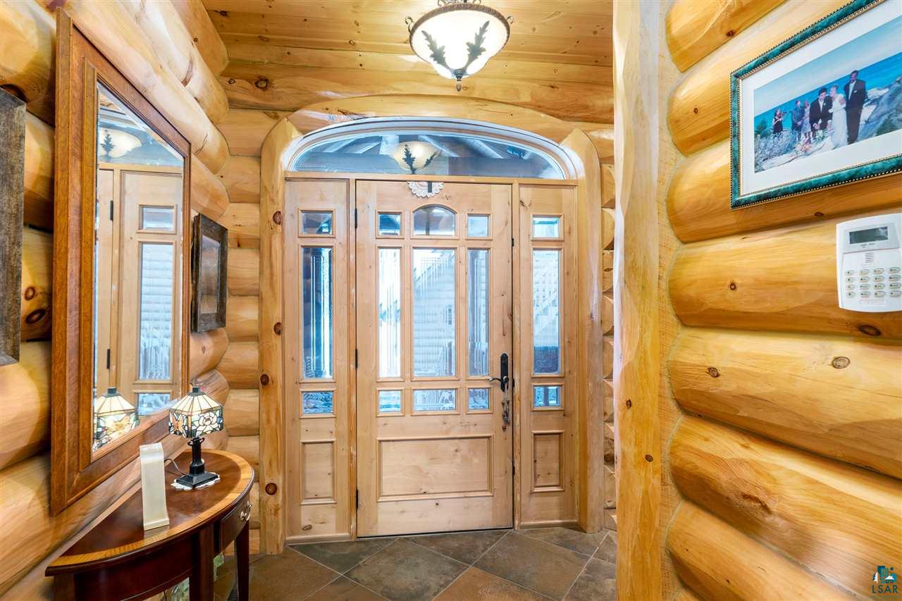5960 North Pike Lake Road Duluth, MN 55811 - Photo 4 of 49 An entry way foyer allows you the chance to take off shoes and houses a powder room!