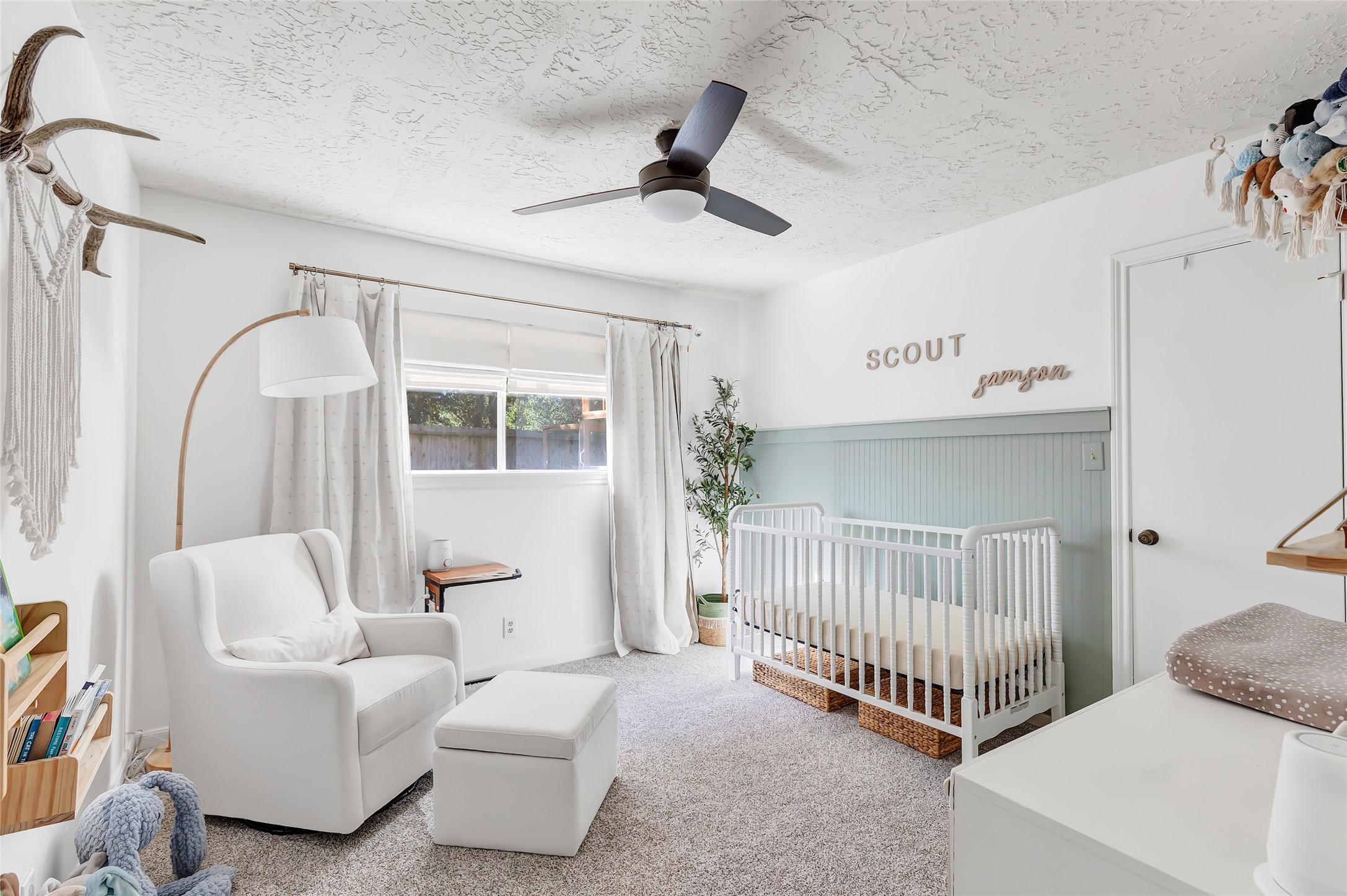 3 Baron's Place Conroe, TX 77304 - Photo 19 of 28 a bedroom with furniture and white walls