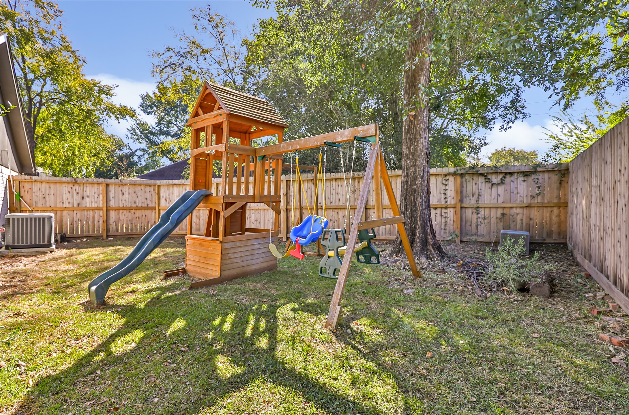3 Baron's Place Conroe, TX 77304 - Photo 27 of 28 a view of a house with a park