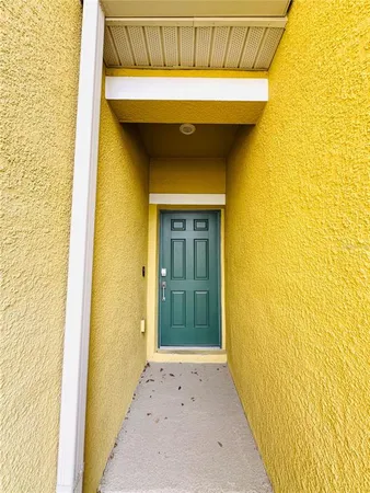 a front view of a house with a door