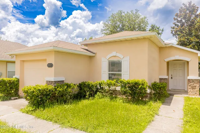 a front view of house with yard
