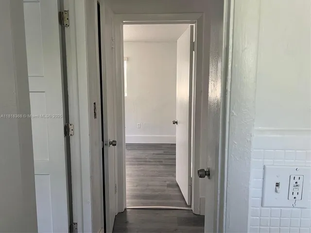 a view of a bathroom with a glass door