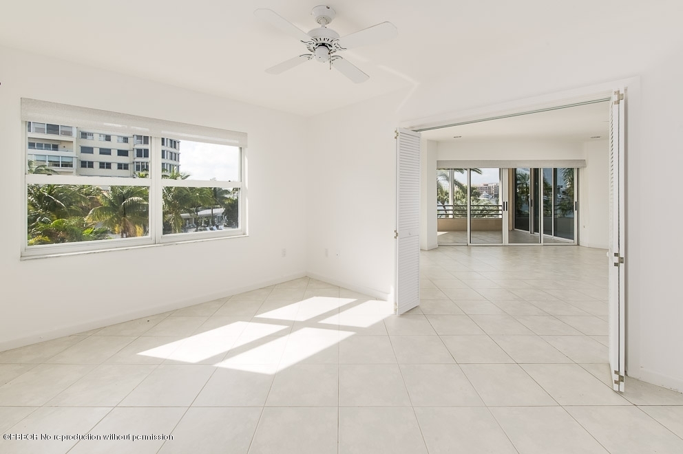 44 Cocoanut Row, Unit 214A Palm Beach, FL 33480 - Photo 7 of 13 an empty room with windows and entrance