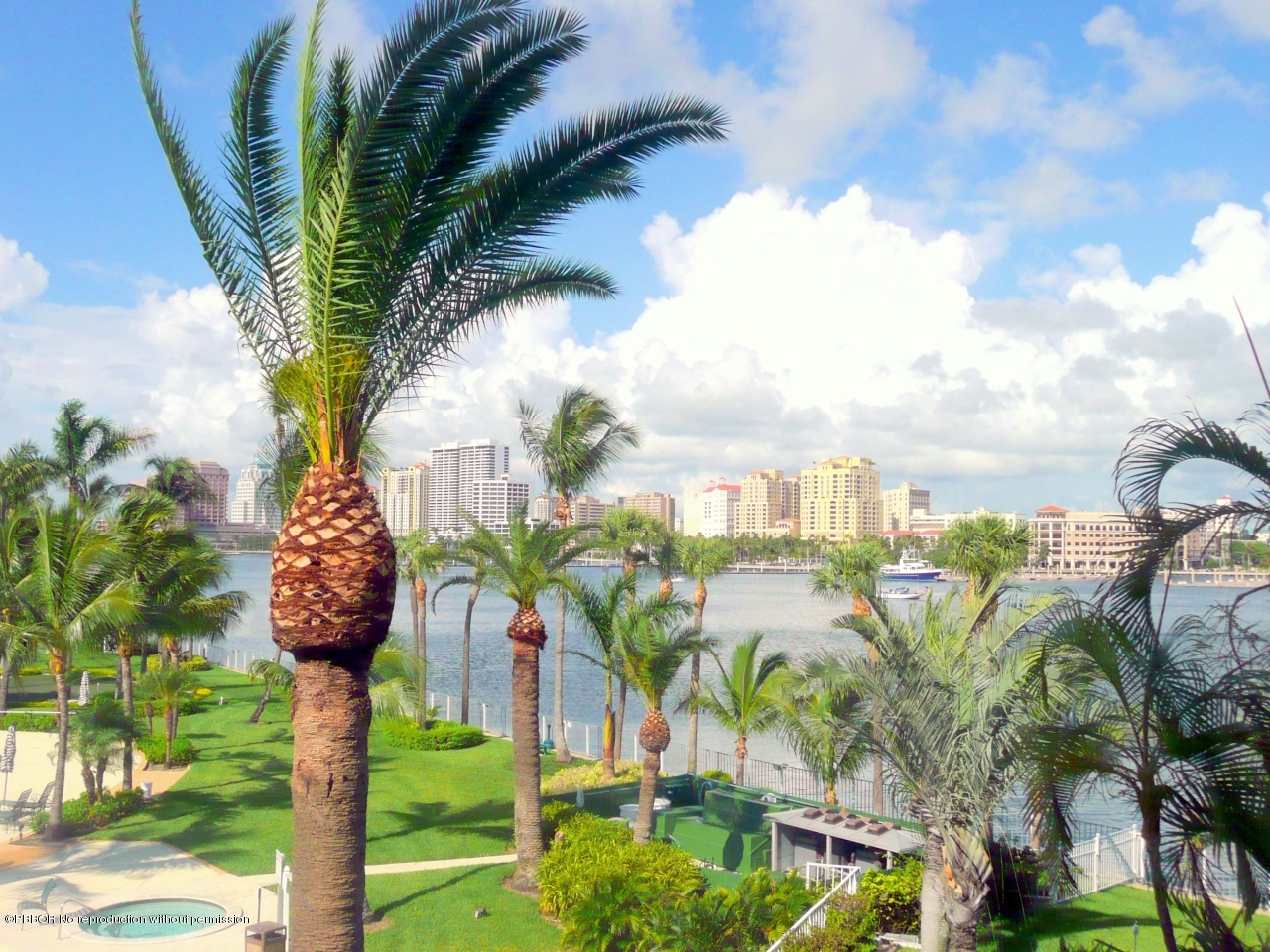 44 Cocoanut Row, Unit 214A Palm Beach, FL 33480 - Photo 10 of 13 a view of a flower in front of the house