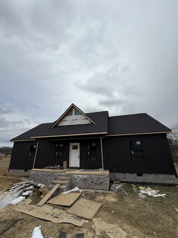 a front view of a house with garage