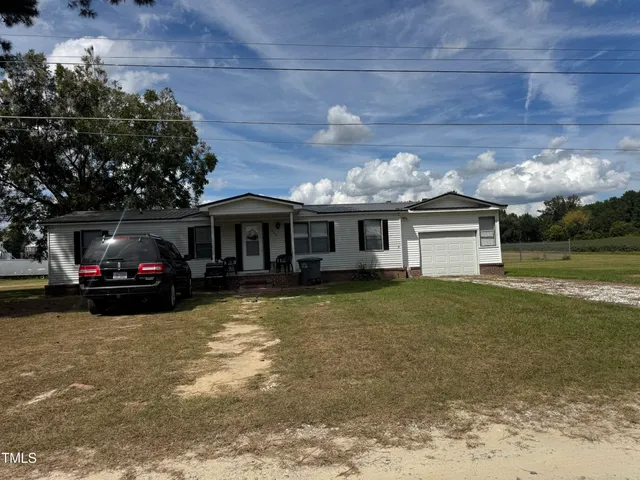 a view of a house with a patio