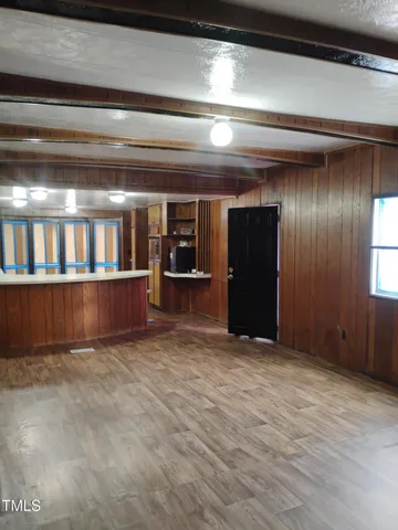 a kitchen with wooden cabinets and a sink