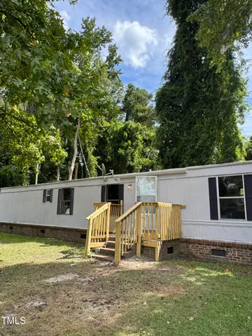 a view of a house with a swimming pool