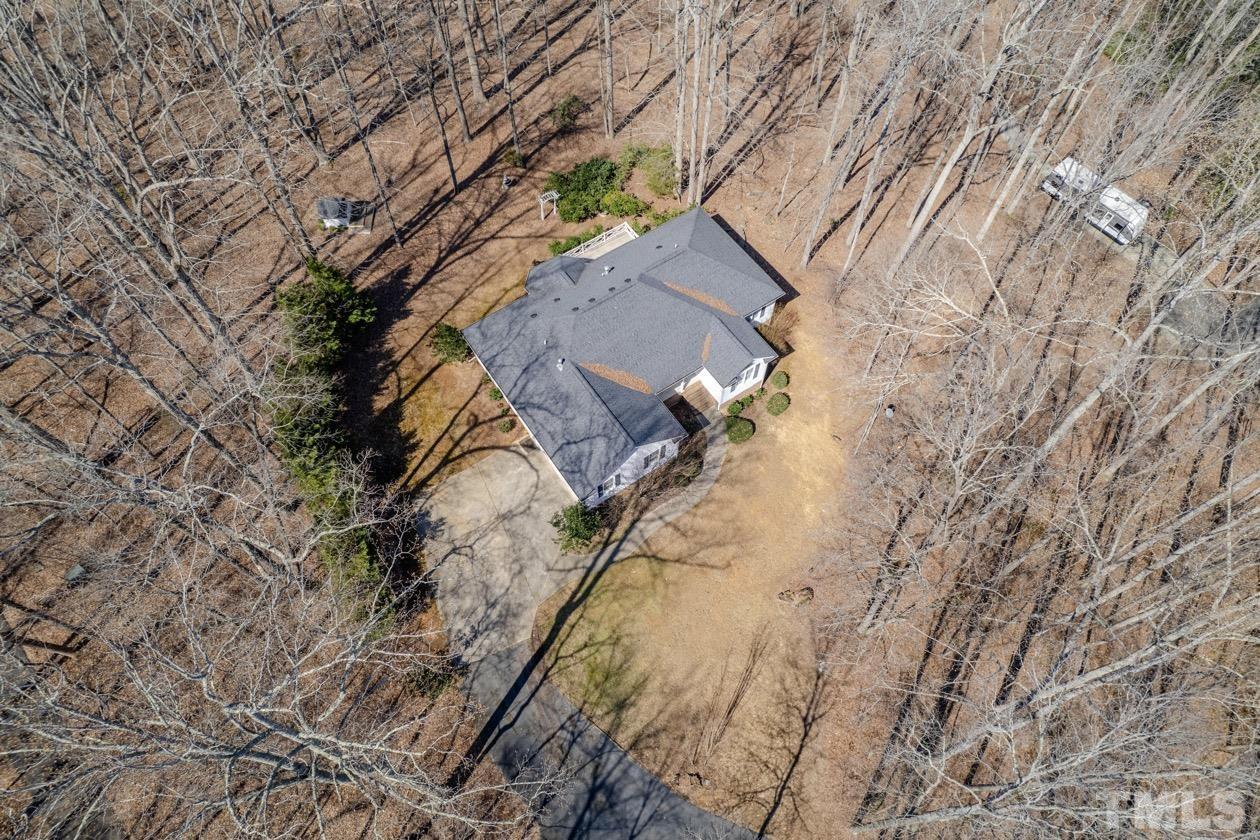 302 Shetland Road Rougemont, NC 27572 - Photo 15 of 47 a view of a yard with a trees