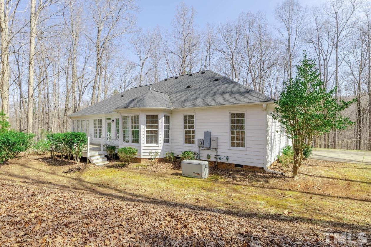 302 Shetland Road Rougemont, NC 27572 - Photo 3 of 47 a view of a house with backyard porch and sitting area