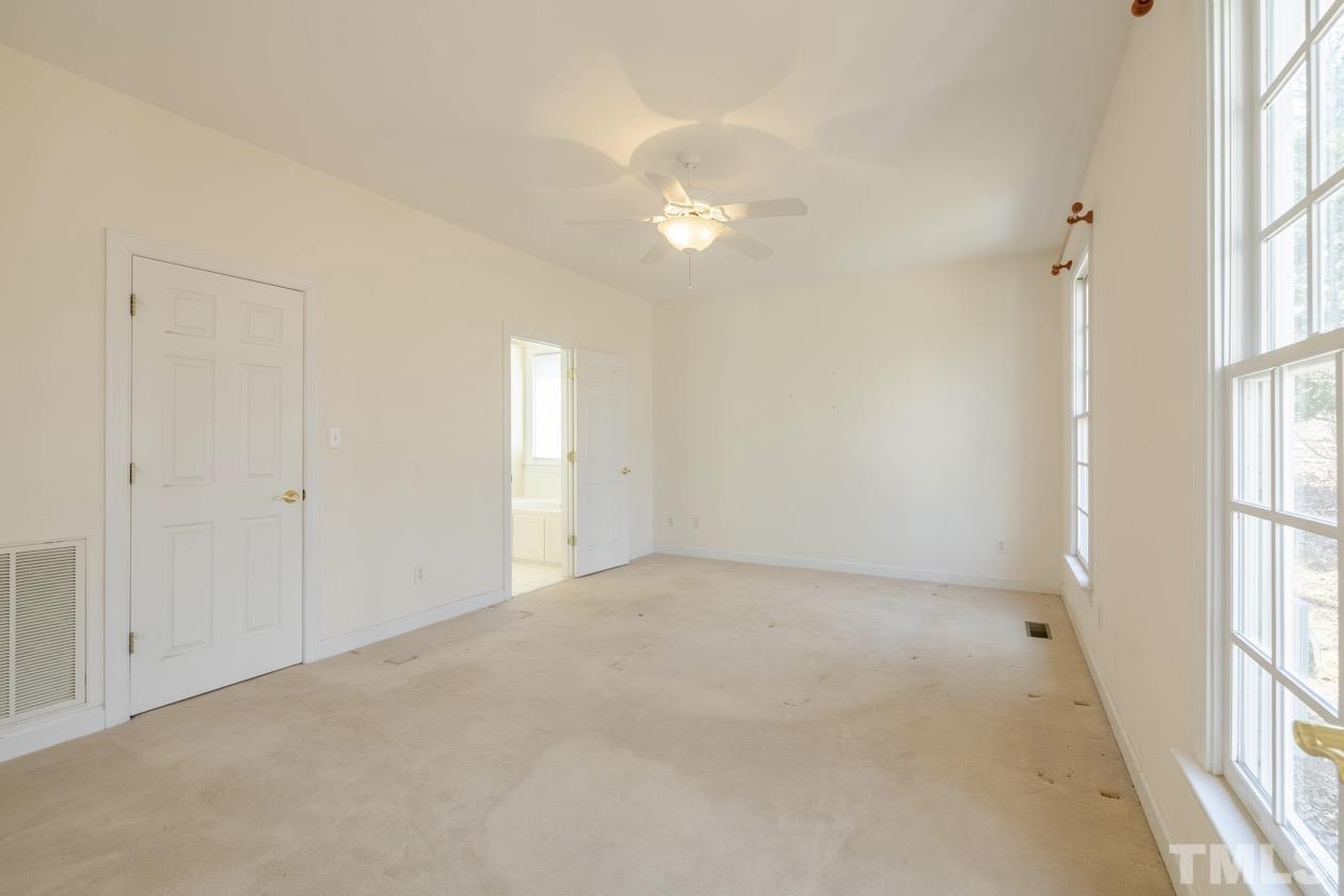 302 Shetland Road Rougemont, NC 27572 - Photo 38 of 47 an empty room with windows and entrance