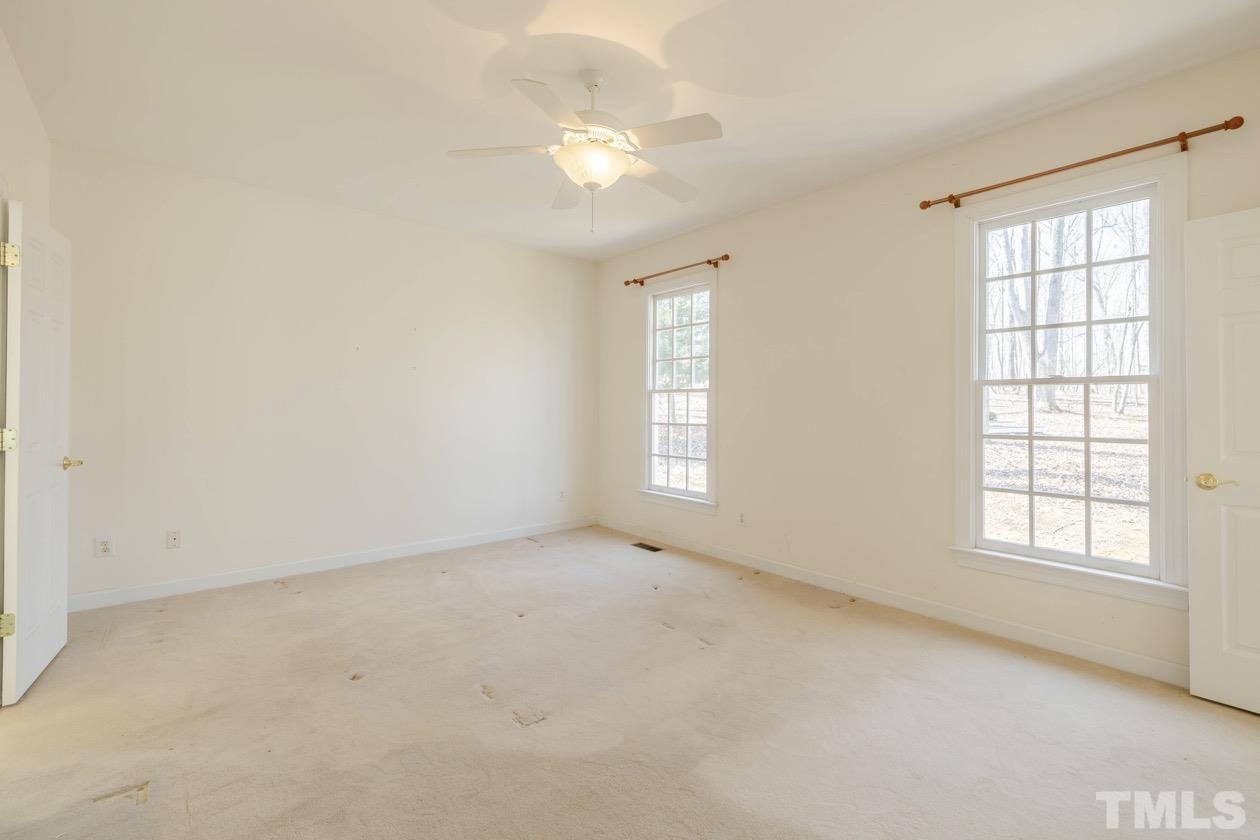 302 Shetland Road Rougemont, NC 27572 - Photo 39 of 47 an empty room with windows and closet