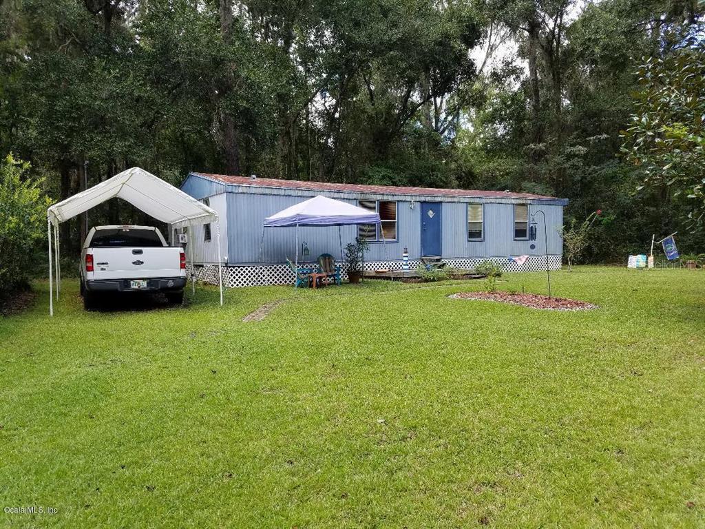 10055 Northwest 200th Street Road Micanopy, FL 32667 - Photo 1 of 1 1