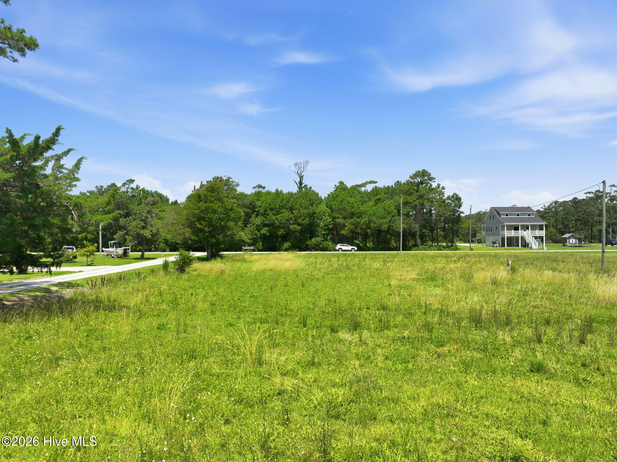 233 Ferry Dock Road Gloucester, NC 28528 - Photo 11 of 15 Ground Level View Facing Ferry Dock Rd