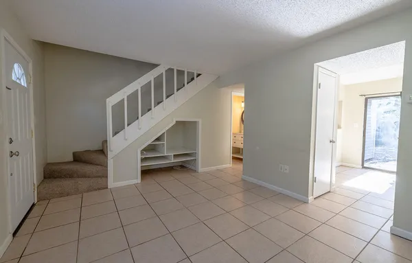 a view of an entryway with stairs
