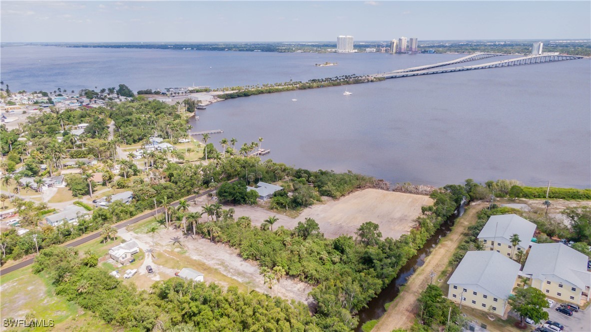 1069 River Road North Fort Myers, FL 33903 - Photo 5 of 7 an aerial view of a residential houses and outdoor space
