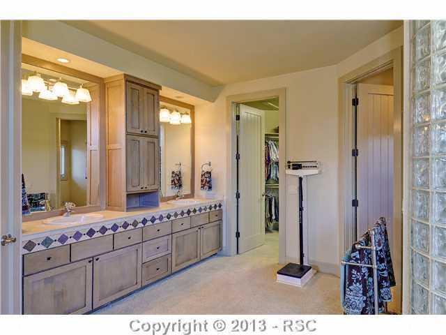 4265 Hidden Rock Road Colorado Springs, CO 80908 - Photo 16 of 25 Luxurious 5-Piece Master Bath includes Jetted Tub, Glass Block Shower & Double Vanities