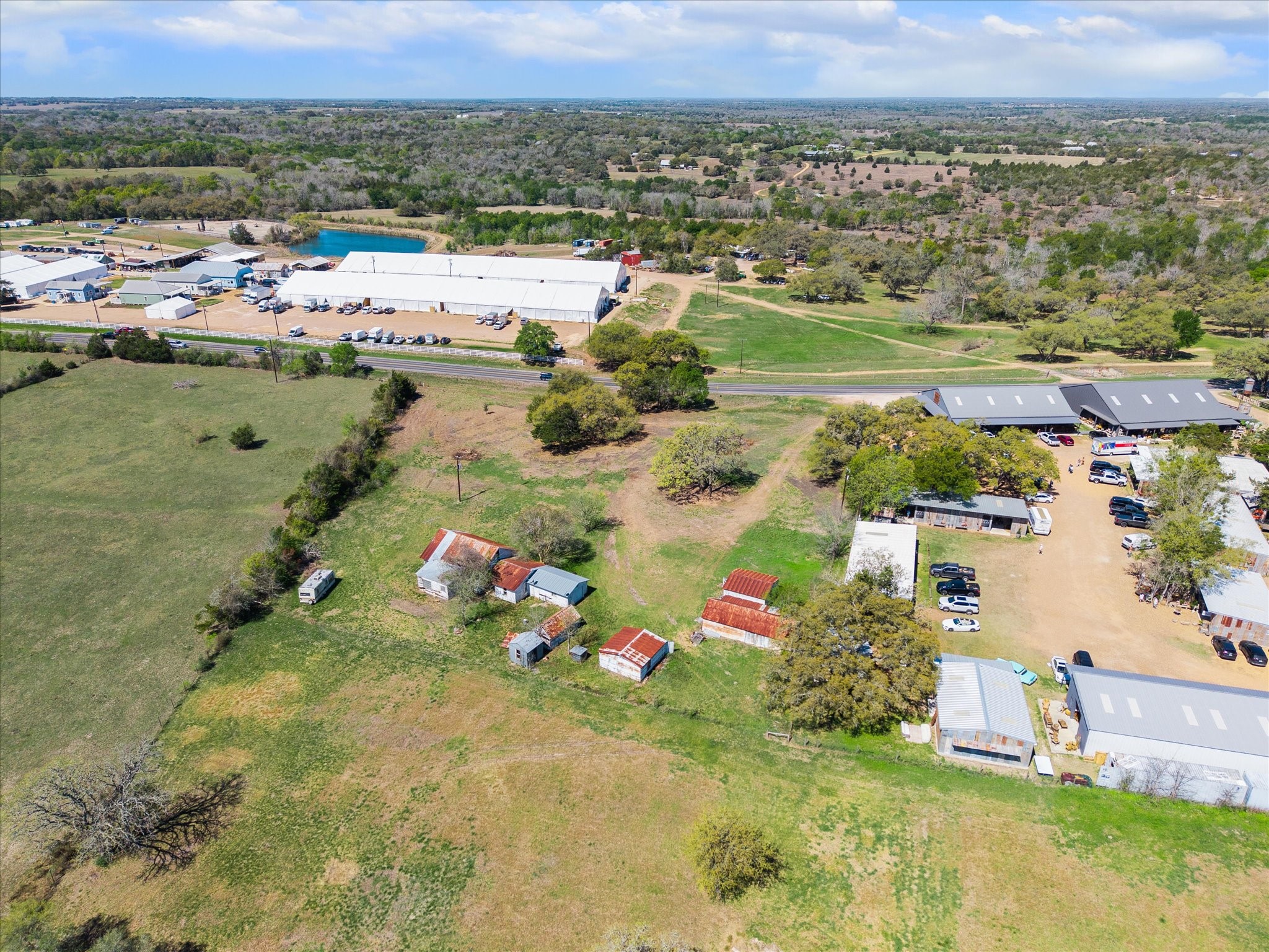 2121 Highway 237 Round Top, TX 78954 - Photo 7 of 8 an aerial view of residential houses with outdoor space