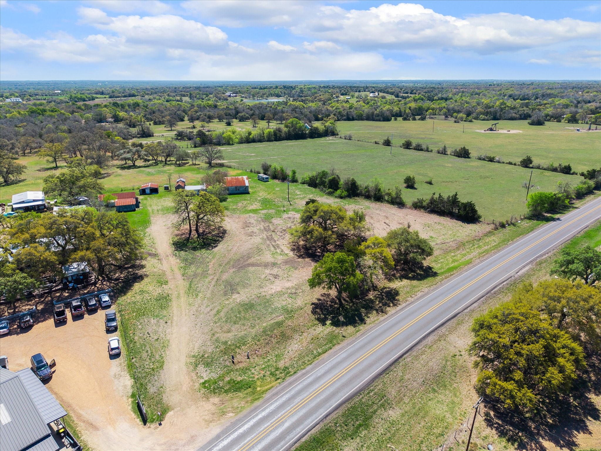 2121 Highway 237 Round Top, TX 78954 - Photo 8 of 8 a view of a lake with a houses
