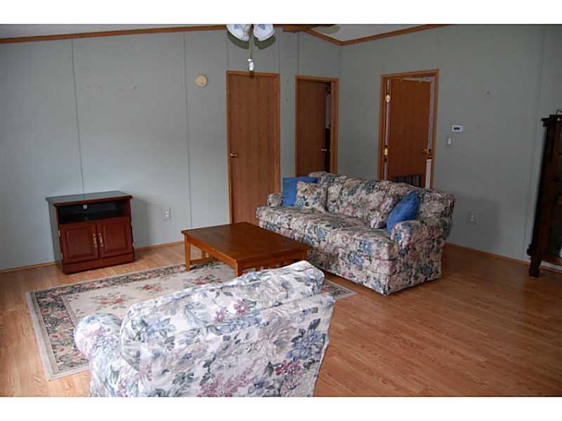 23 Spring Street Mechanic Falls, ME 04256 - Photo 9 of 29 Living Room.