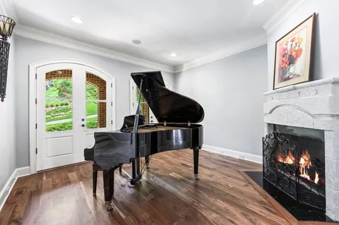 a kitchen with stainless steel appliances granite countertop a refrigerator and a stove