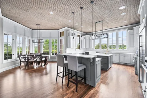 a view of balcony with furniture