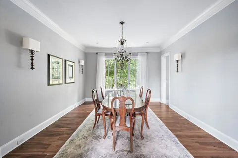 a spacious bedroom with a bed and window