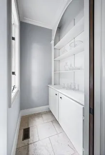a spacious bathroom with a granite countertop sink toilet and shower