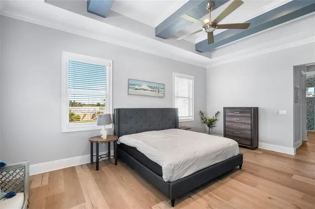 a bedroom with a bed and a table in it