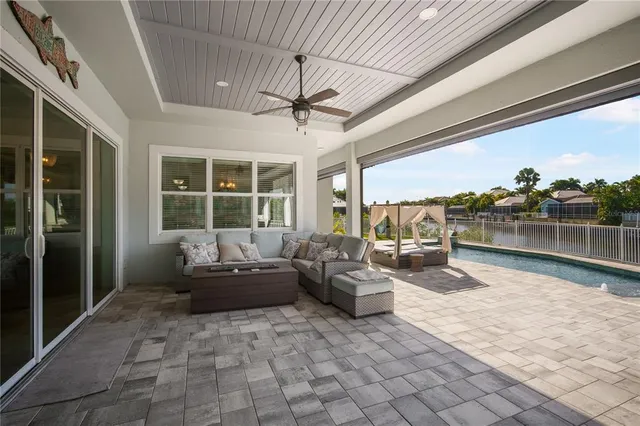a lobby with furniture and floor to ceiling window