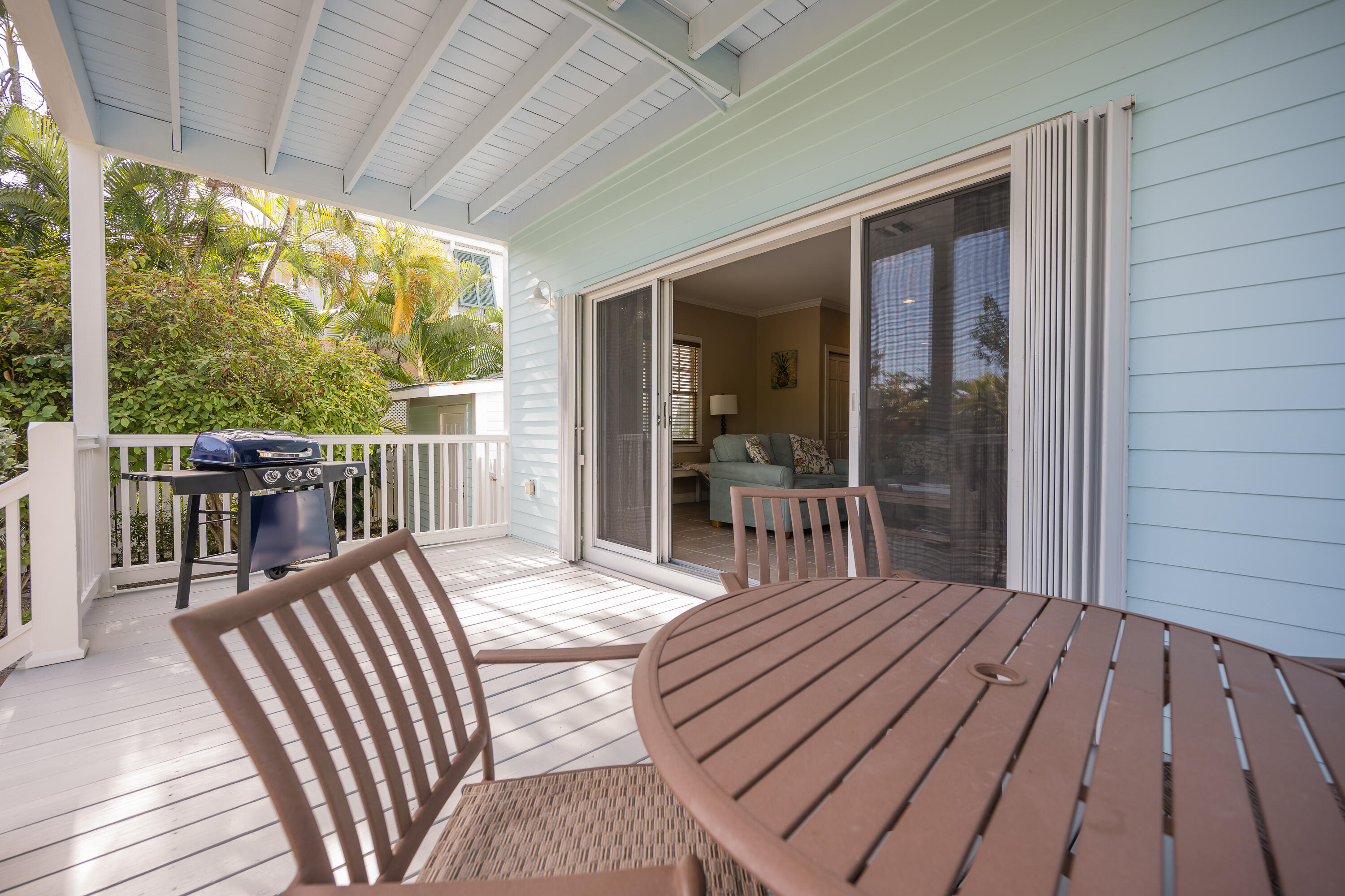 243 Golf Club Drive Key West, FL 33040 - Photo 14 of 54 a view of a patio with wooden floor