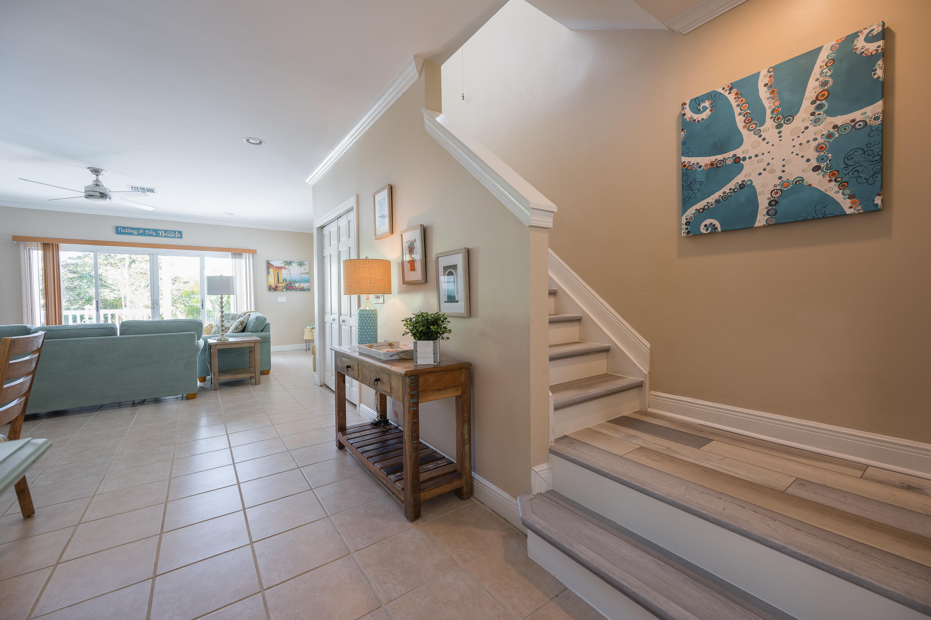 243 Golf Club Drive Key West, FL 33040 - Photo 22 of 54 a view of a livingroom with furniture and staircase