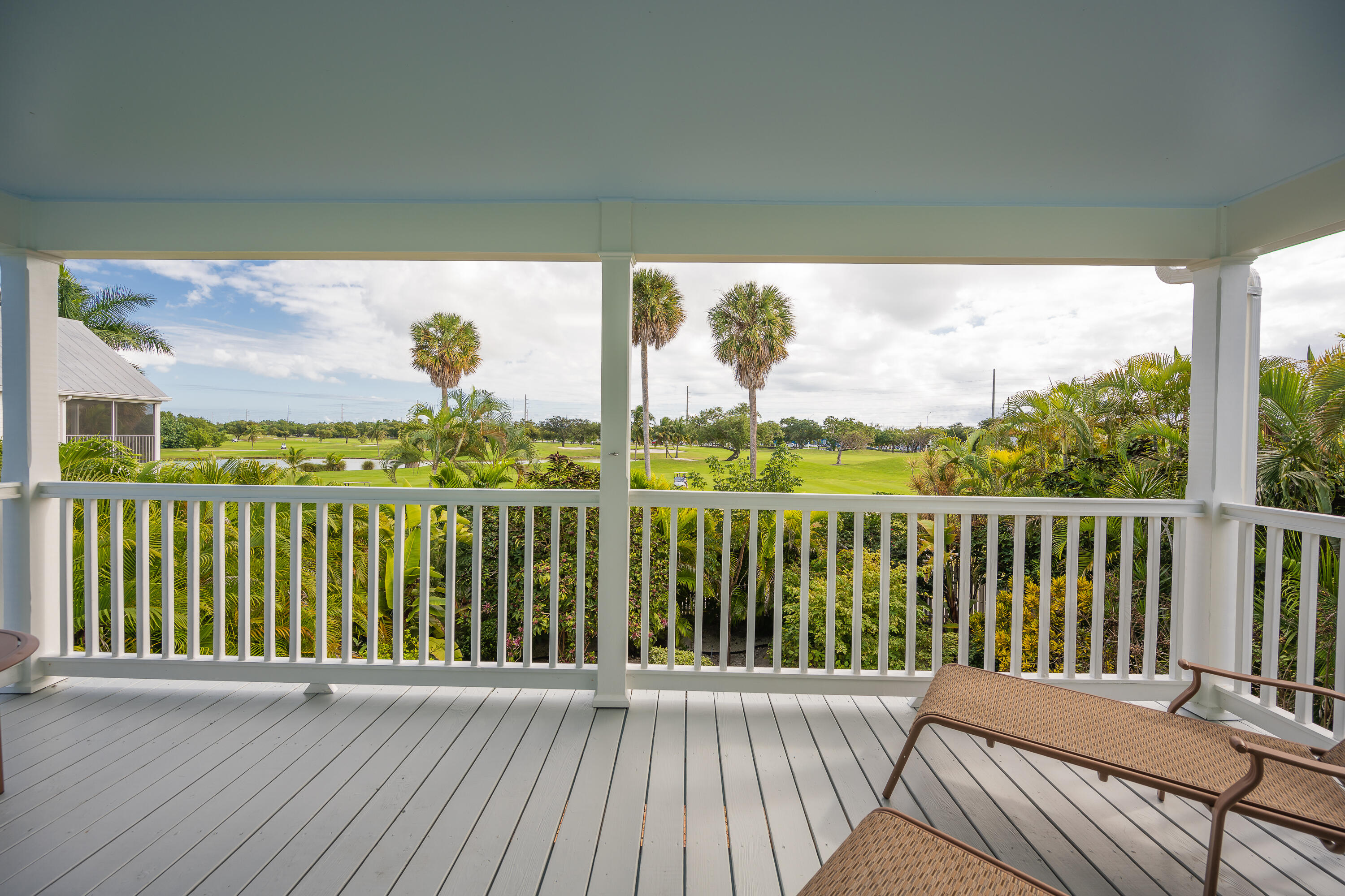 243 Golf Club Drive Key West, FL 33040 - Photo 25 of 54 a view of a balcony with wooden floor