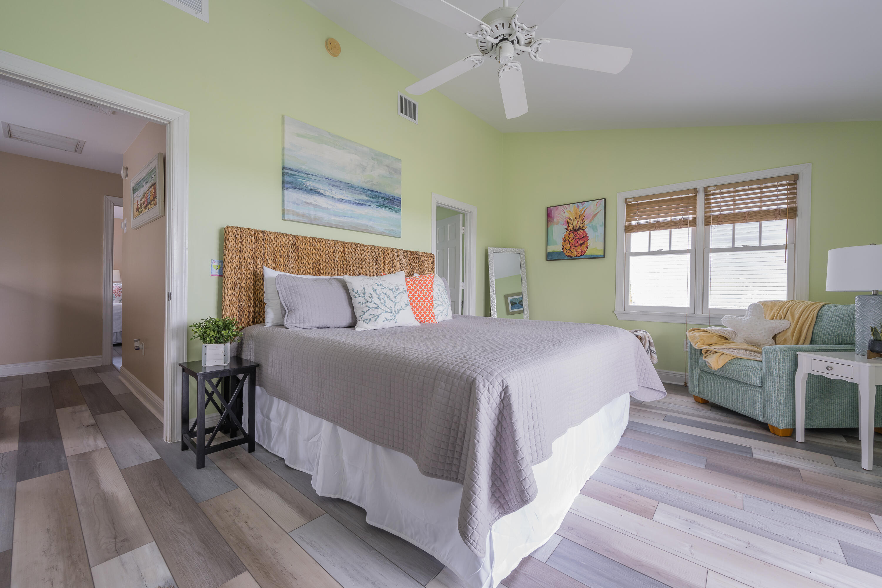 243 Golf Club Drive Key West, FL 33040 - Photo 32 of 54 a bedroom with a bed and a chandelier